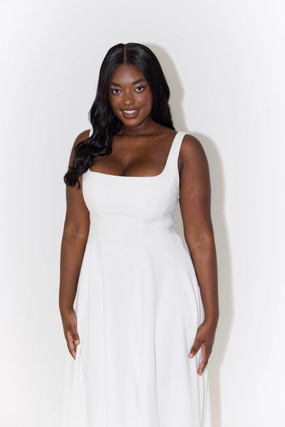 La robe midi taille haute à col carré ultime